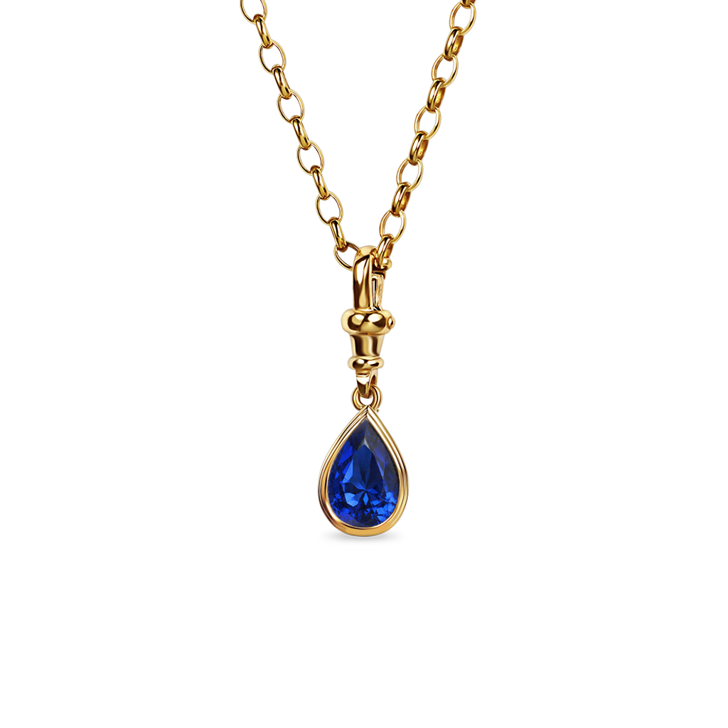 Pear cut blue sapphire pendant necklace set in yellow gold.